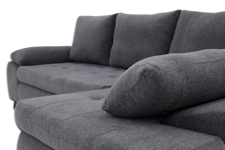 Narożnik Willy L Grafitowy - widok na detal poduszki otomany i siedziska.